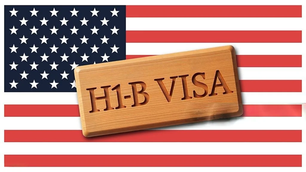 Immigration consultant reviewing visa documents with a client
